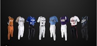 various baseball uniforms are shown on a black background